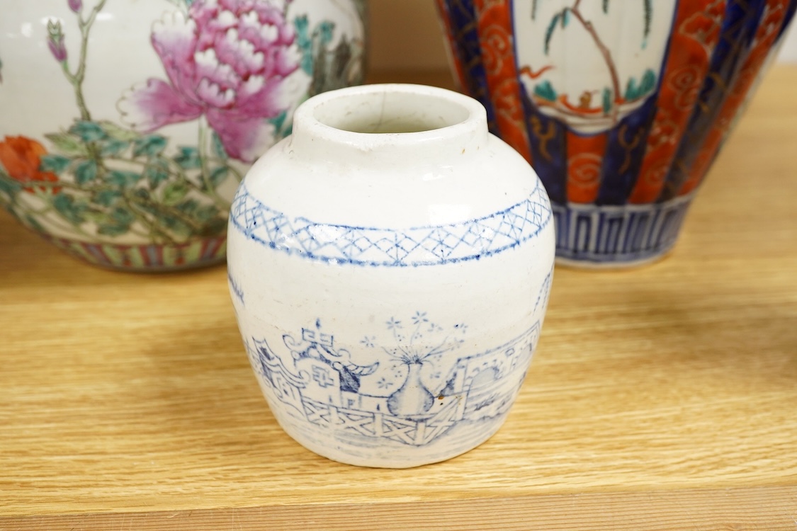 An Imari vase and cover-28cm high, a Chinese jar and prunus vase and a small blue and white jar.
